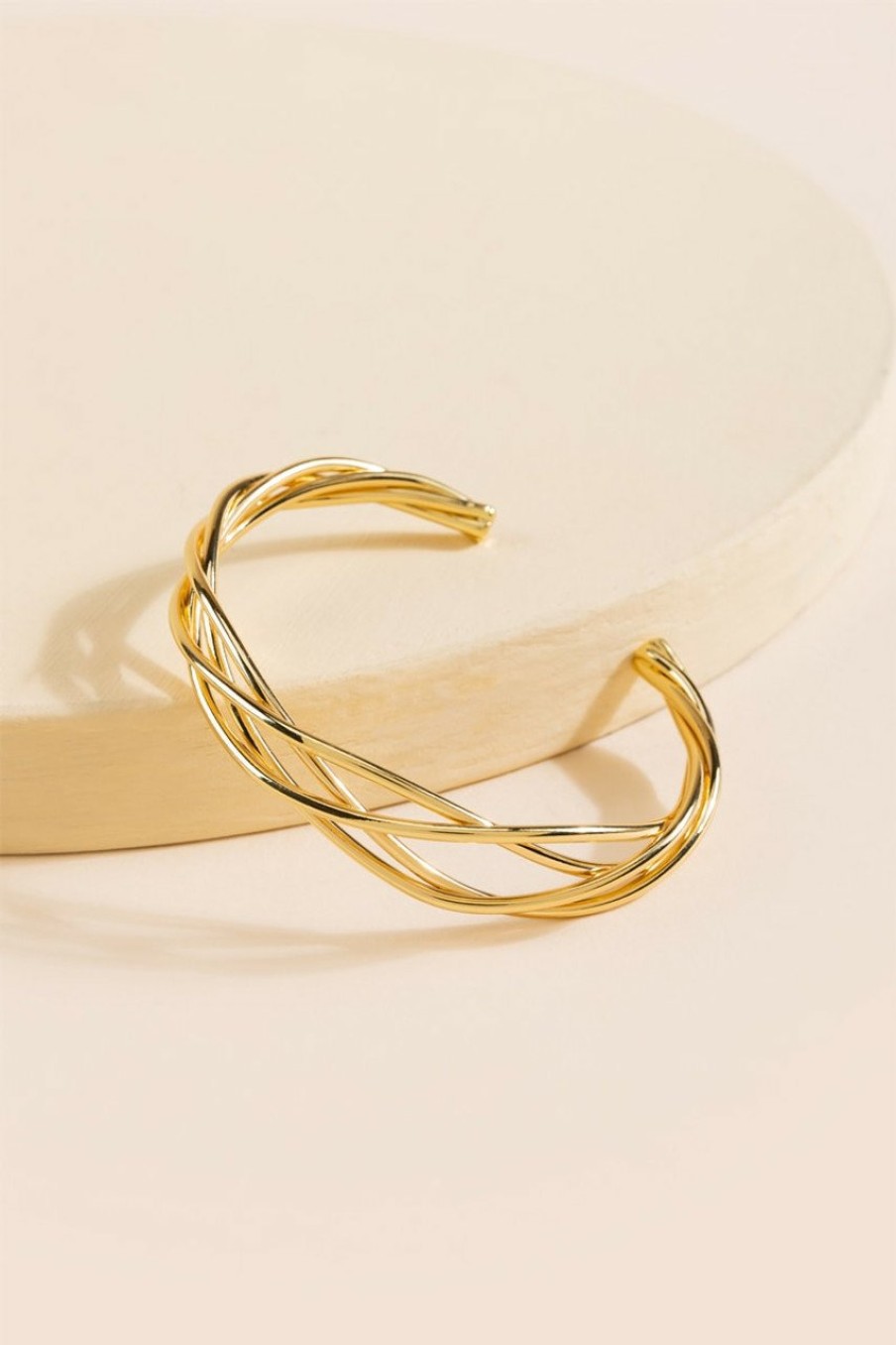 Francesca's Roise Braided Twist Cuff Gold Bracelets