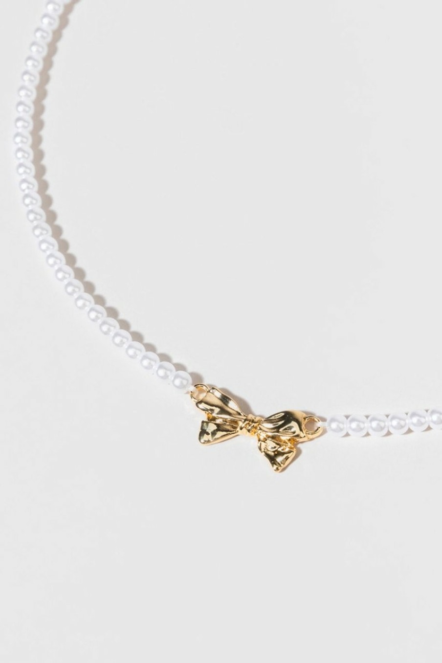 Francesca's Sonya Pearl Bow Tie Necklace Gold Necklaces