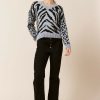 Francesca's Dianne Animal Print V Neck Pullover Tops