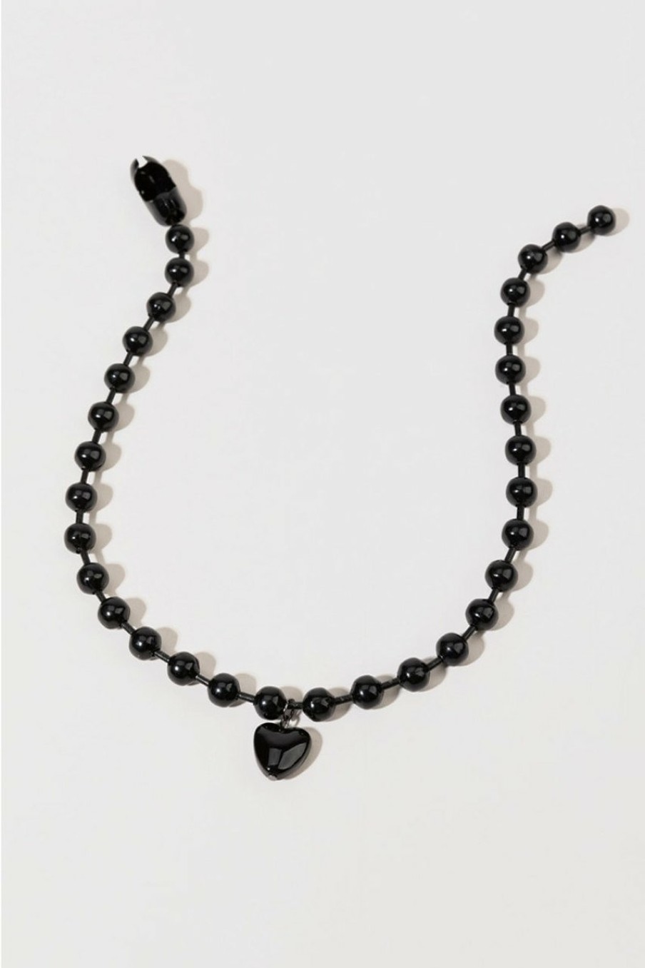 Francesca's Evelyn Metal Ball Heart Pendant Necklace Black Necklaces