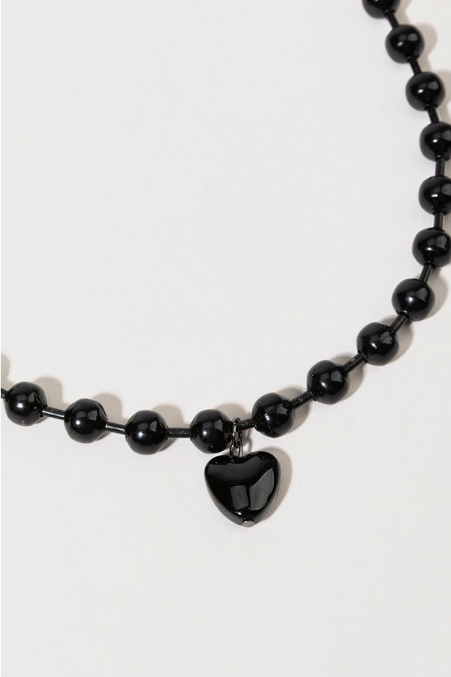 Francesca's Evelyn Metal Ball Heart Pendant Necklace Black Necklaces