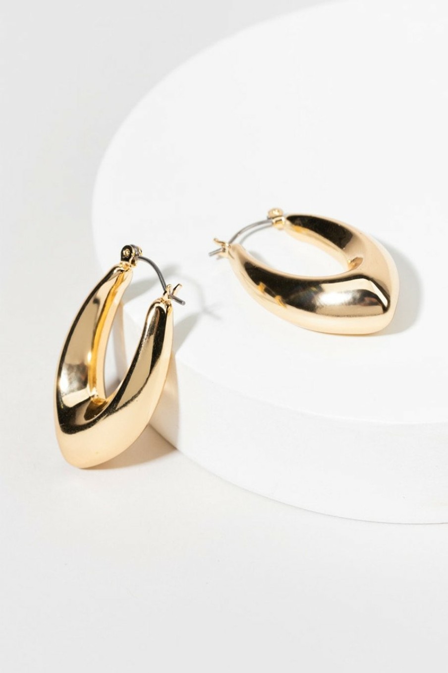 Francesca's Shelly Horn Shape Click Top Hoop Gold Earrings