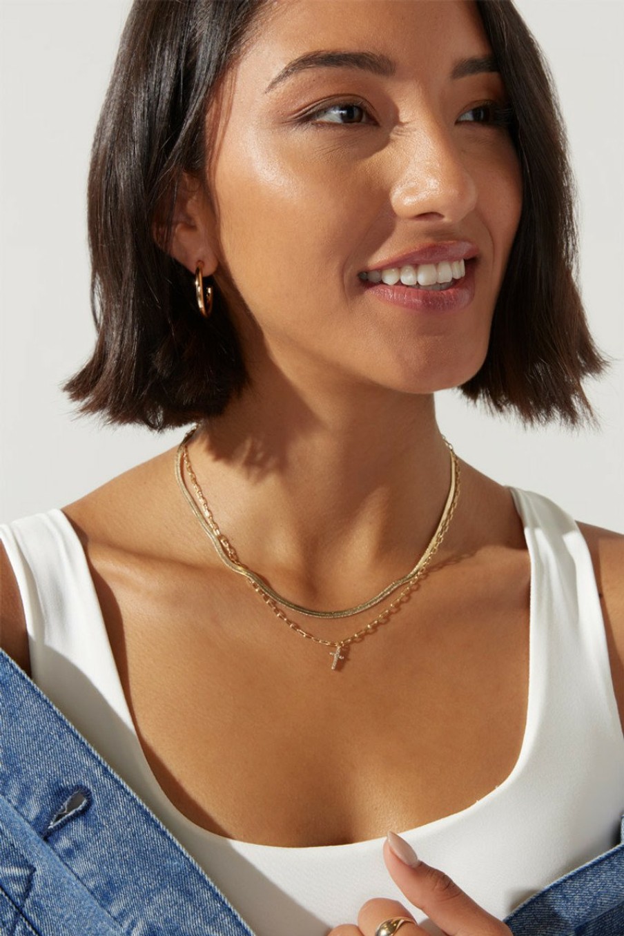 Francesca's Dana En Snake Cross Necklace Gold Necklaces