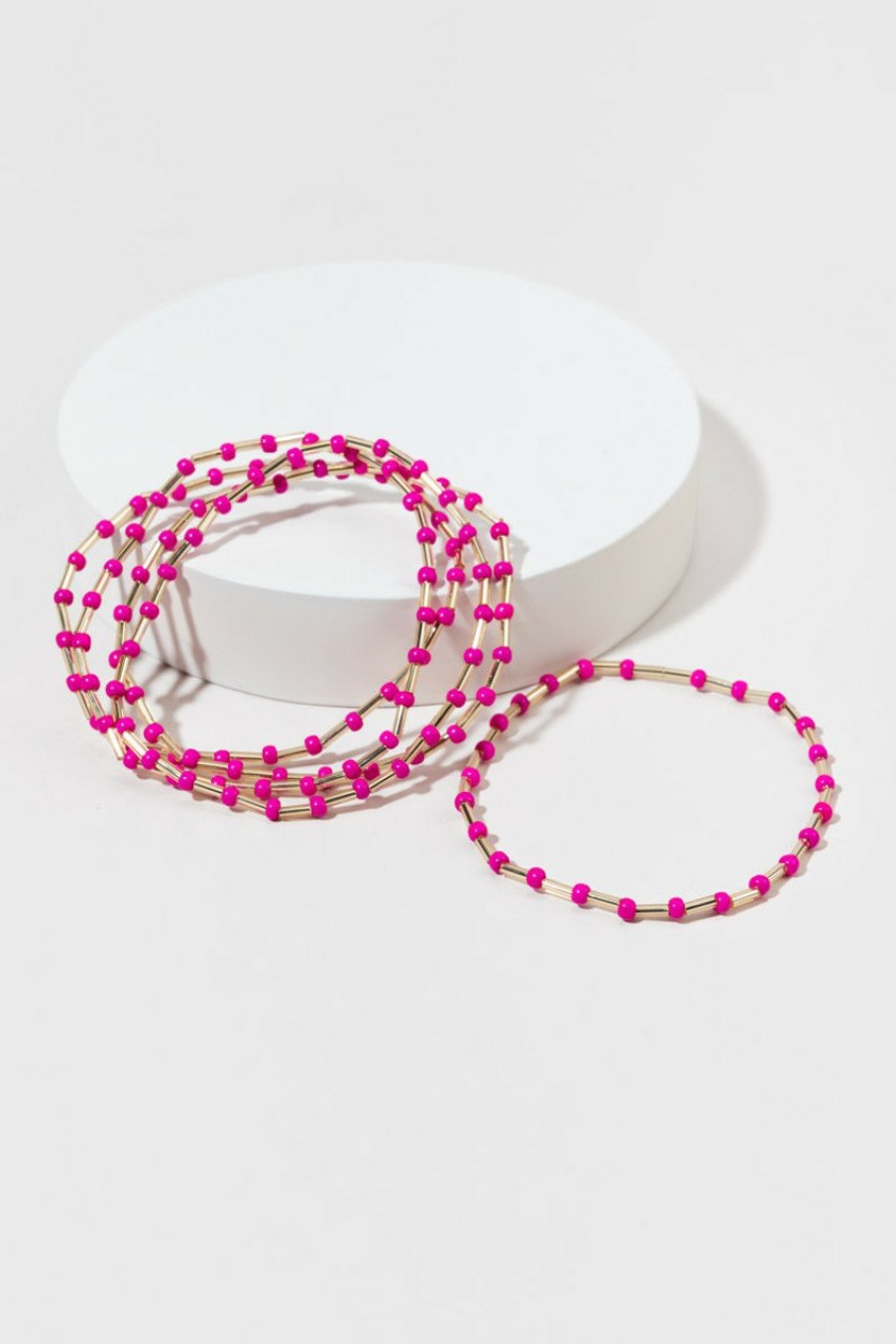 Francesca's Della Cylinder Neon Stretch Bracelet Set Fuchsia Bracelets