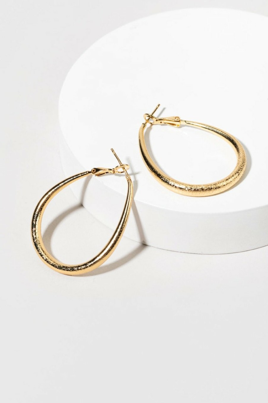 Francesca's Lill Sandblast Oval Hoop Earrings Gold Earrings