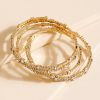 Francesca's Montana Four Row Bangle Gold Bracelets