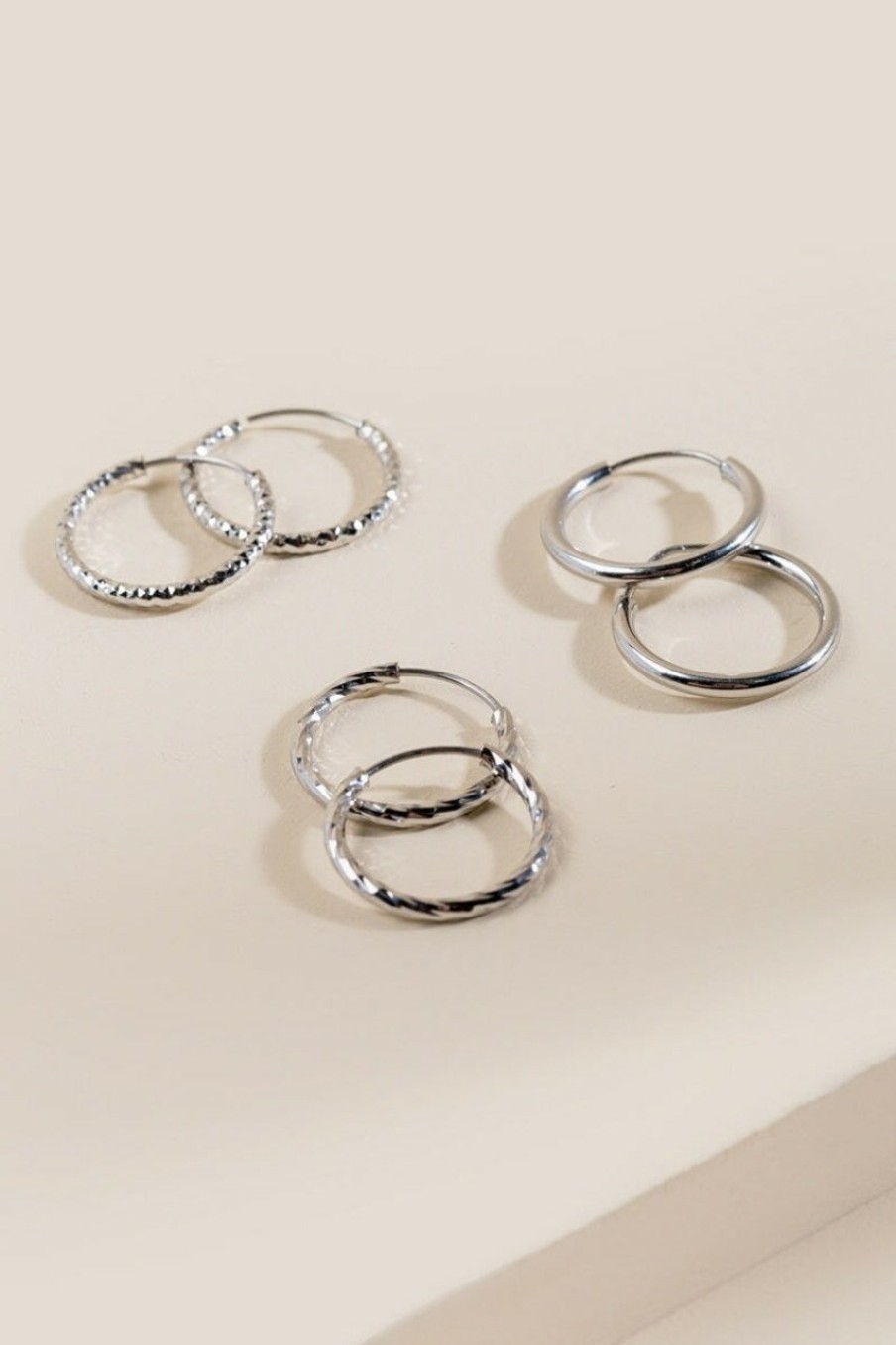 Francesca's Reema Huggie Hoops Set Silver Earrings