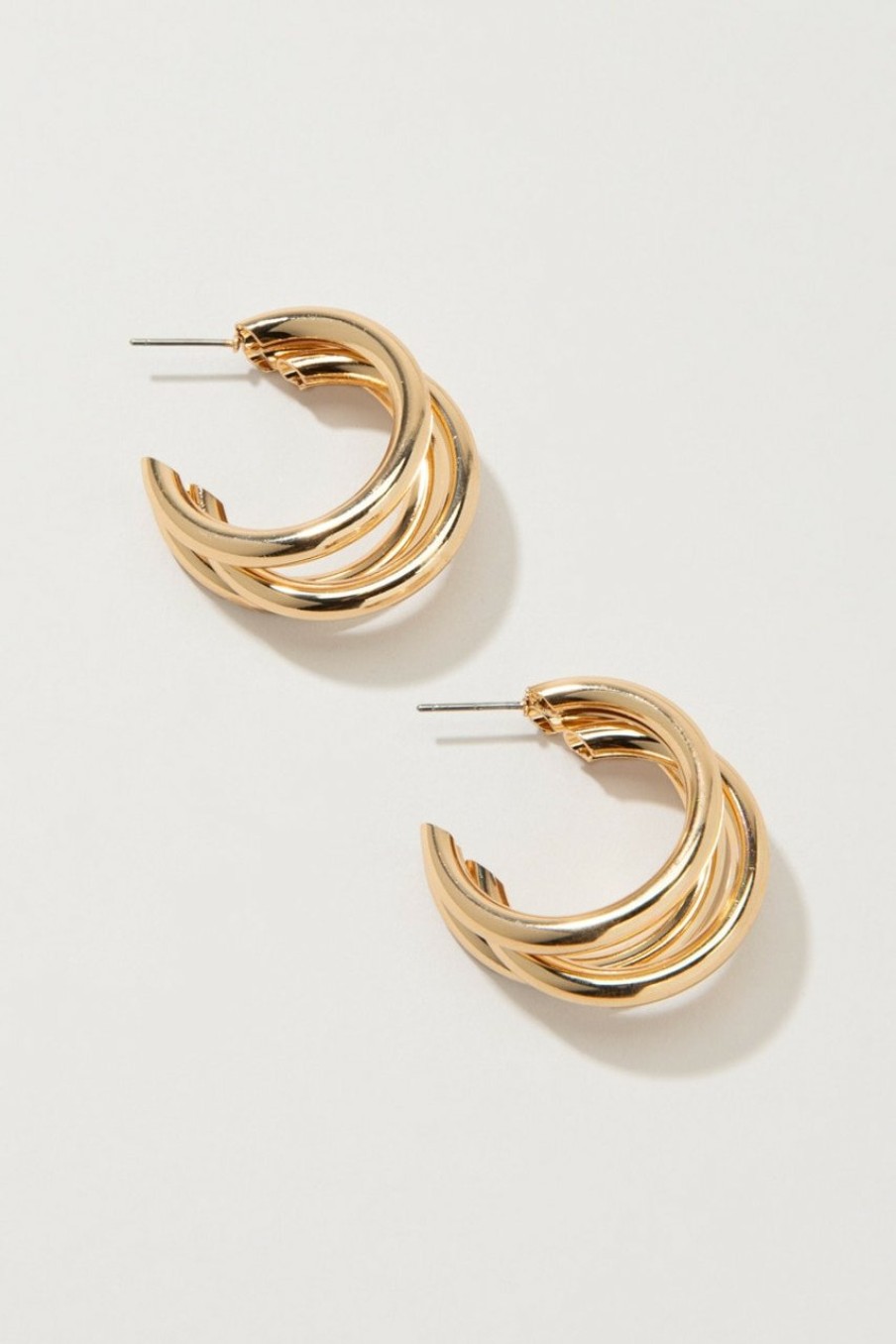 Francesca's Tera Tube Loop Hoop Earrings Gold Earrings