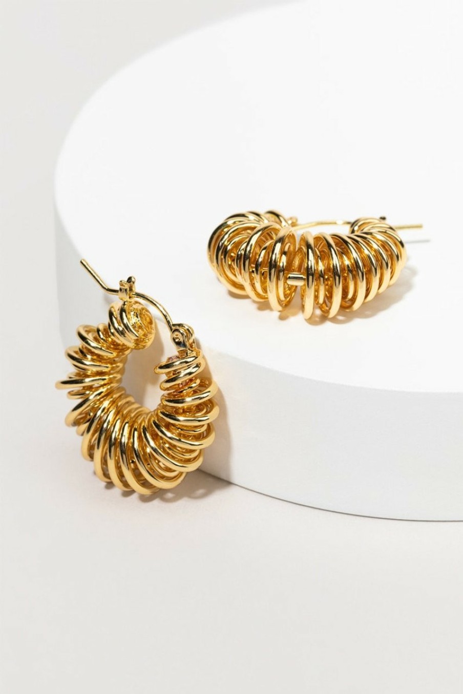 Francesca's Jess Twisted Metal Hoop Earrings Gold Earrings