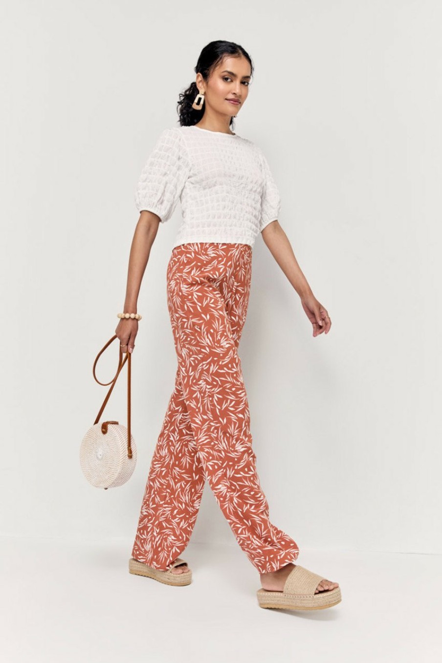 Francesca's Deanna Natural Print Fluid Pants Pants